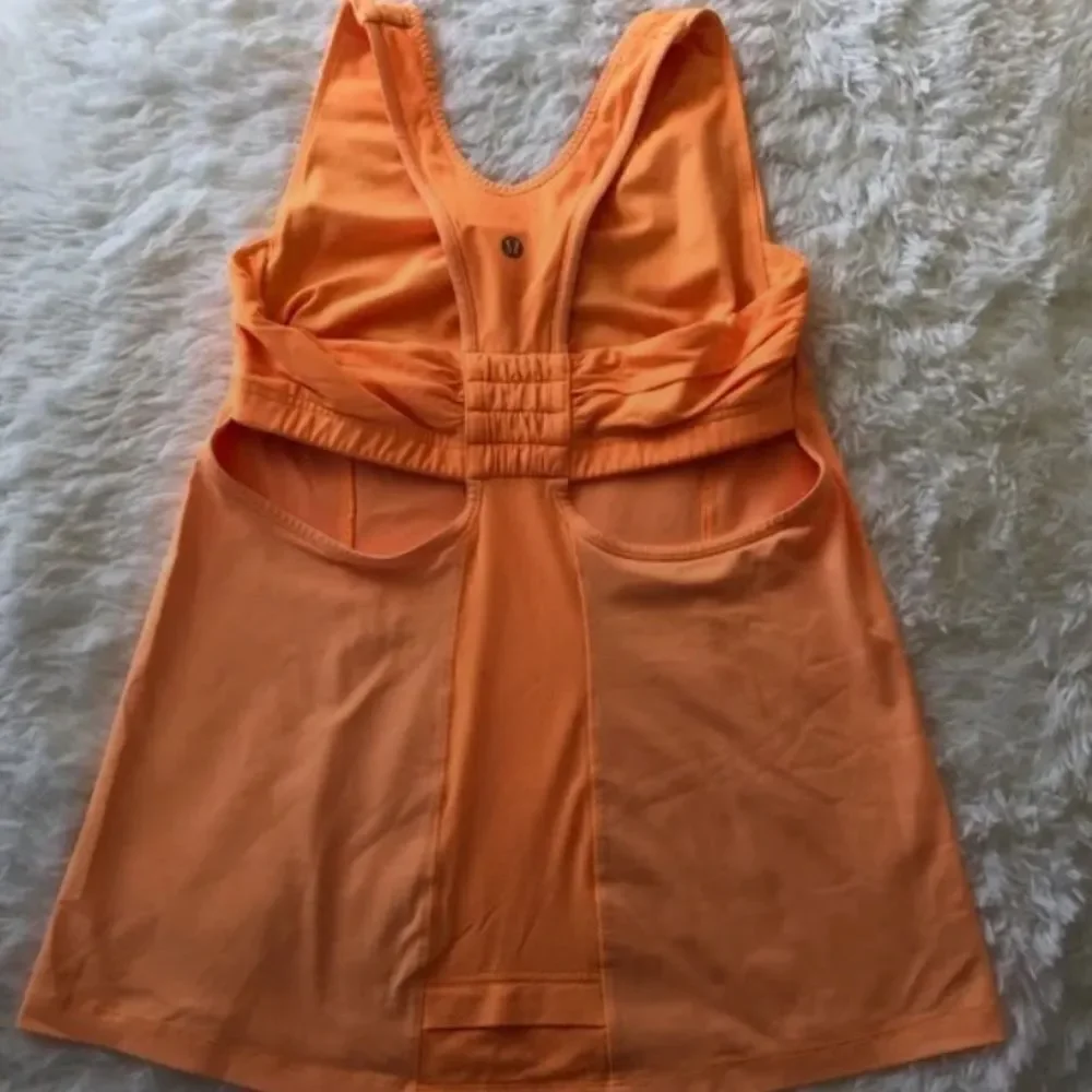 Lululemon Tone It top creamsicle orange